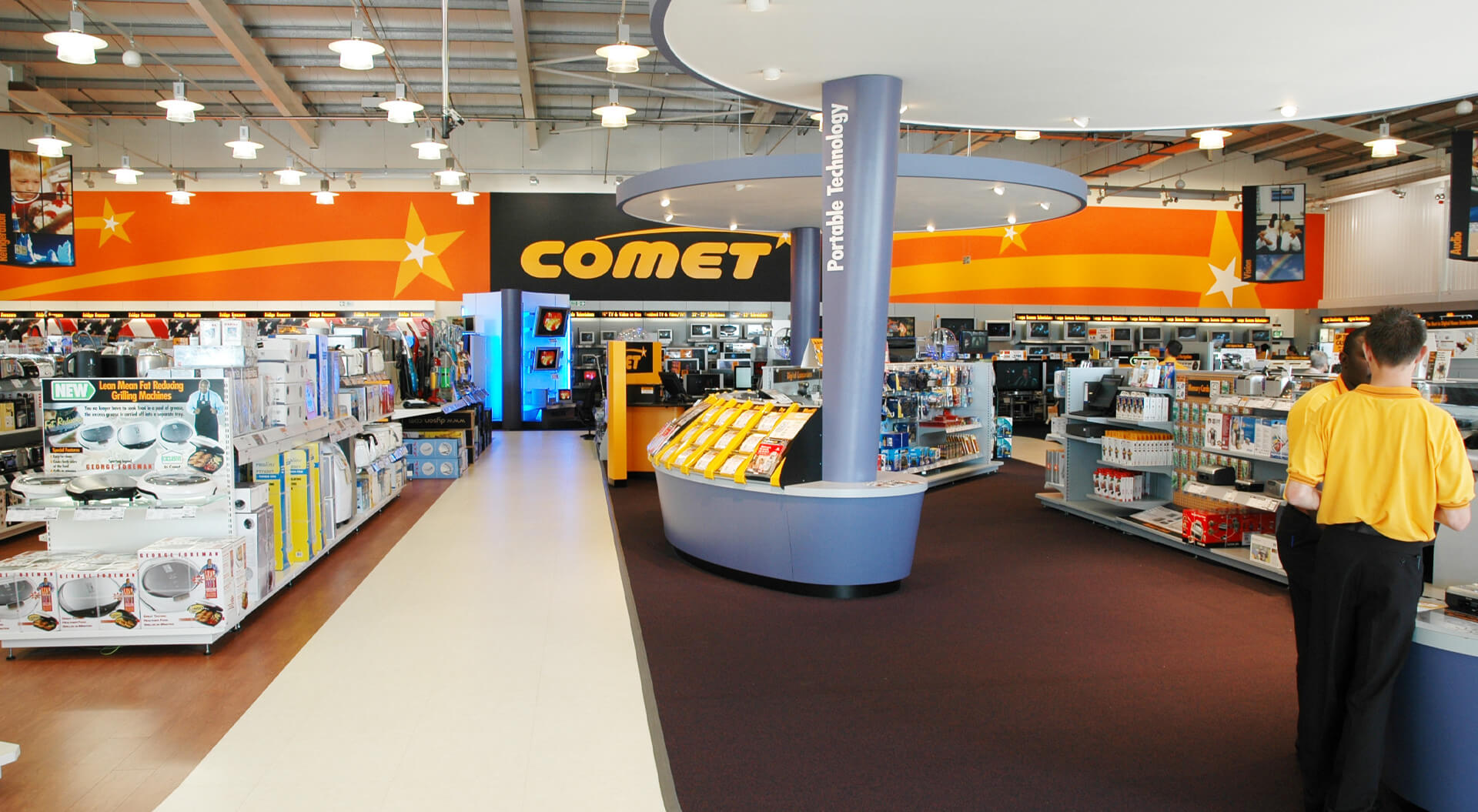 Comet Technology Store rebrand identity, interior design digital camera merchandising display and super graphic wall communication