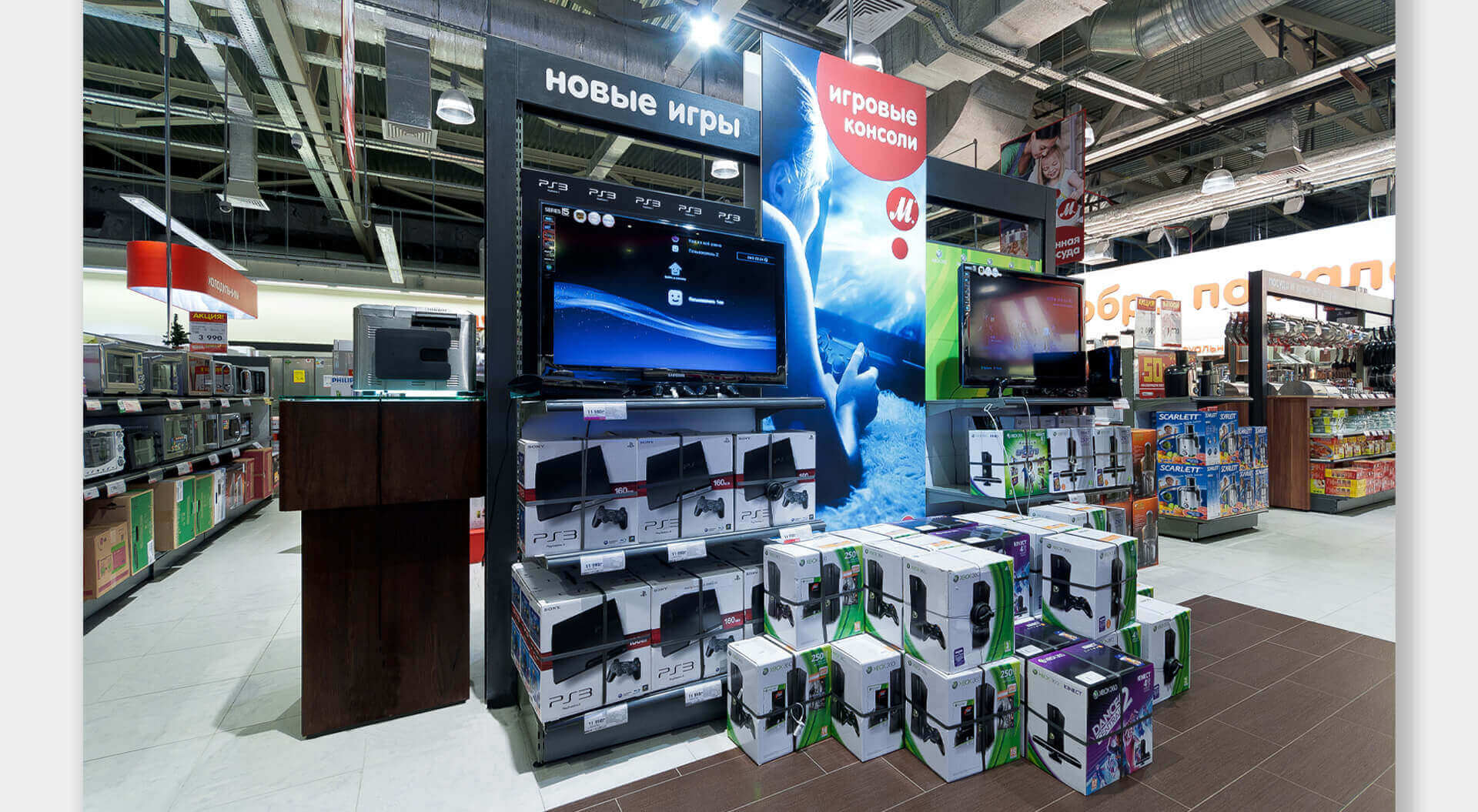 M.Video Technology Stores rebrand and interior design POSM brand communications Games station 