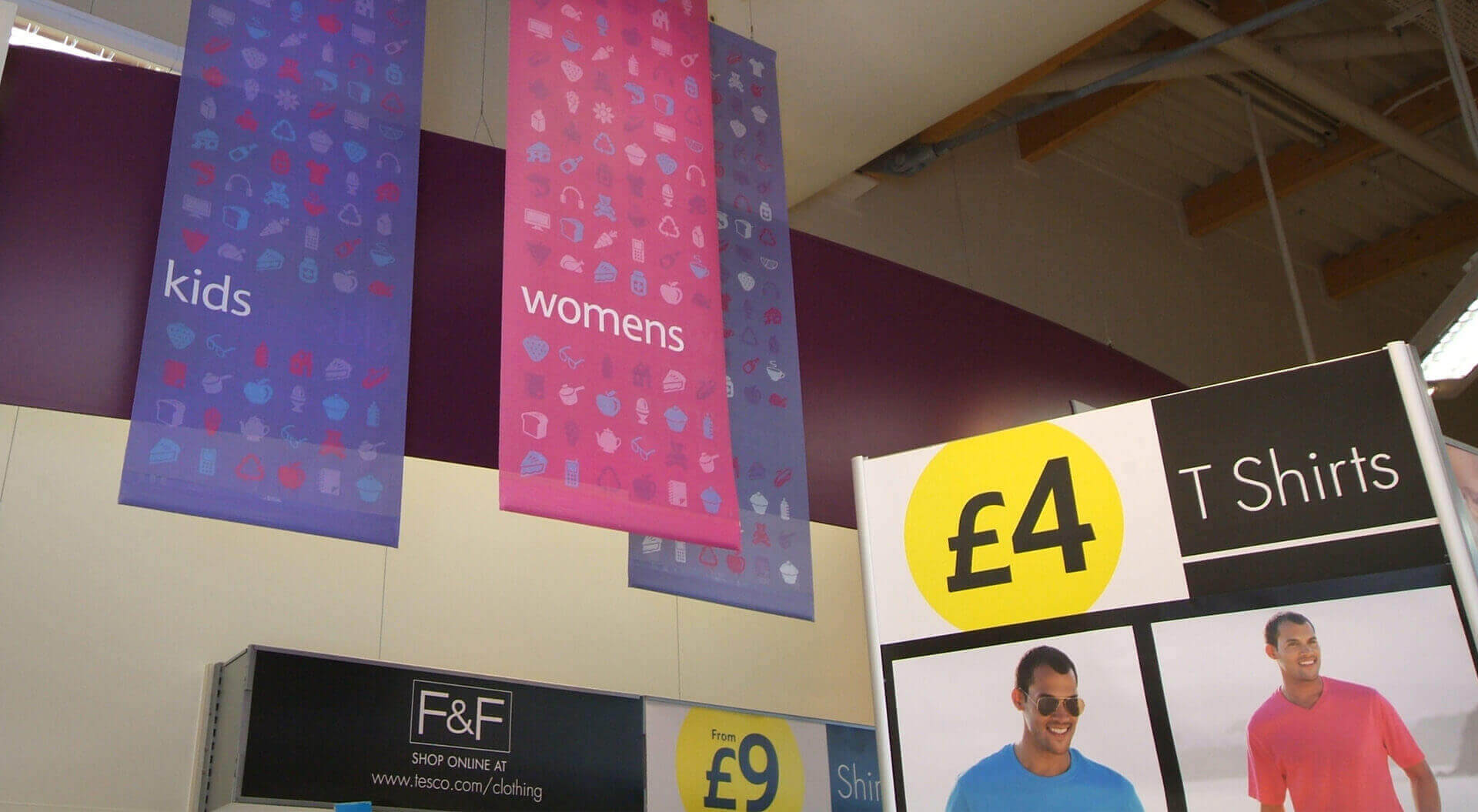  Florence and Fred Tesco fashion Welshpool retail store interior design, rebrand merchandising, colourful hanging banners and price POSM