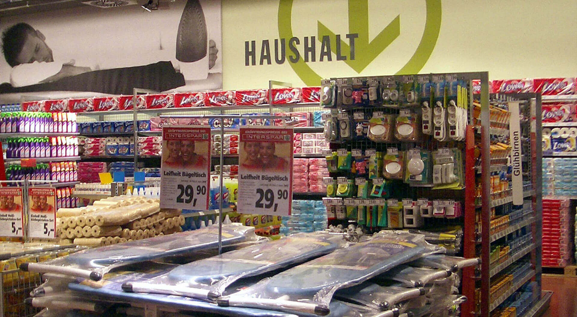Intersar Villach non-food merchandising and department branding for a compact hypermarket
