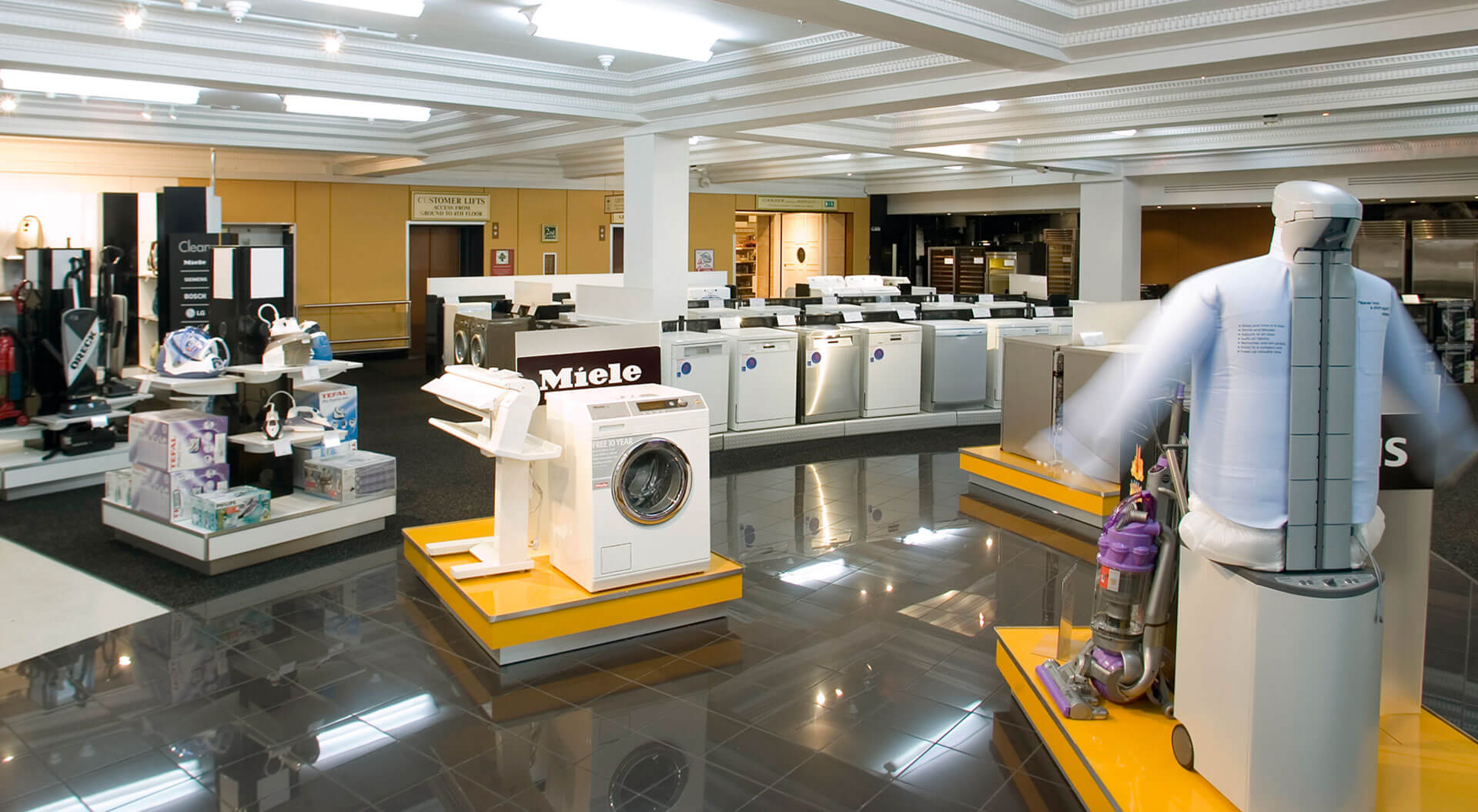 Harrods Department Store rebrand identity, interior design washing machines and white goods display